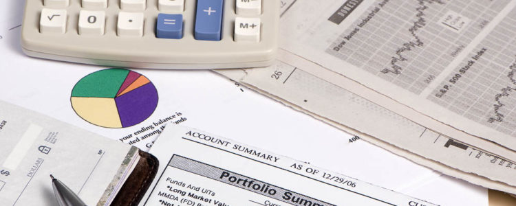 studying the stock reports to figure out where to put your retirement money.