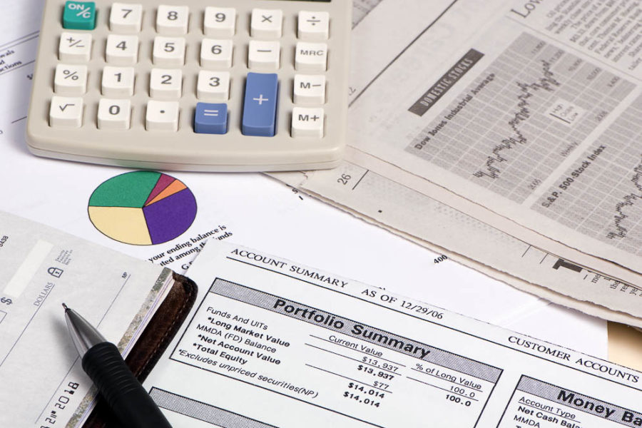 studying the stock reports to figure out where to put your retirement money.